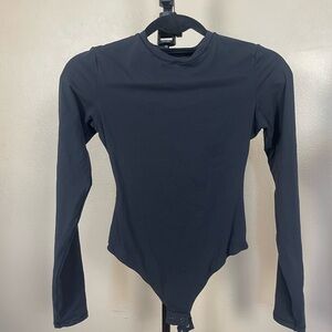 Skims long-sleeve bodysuit